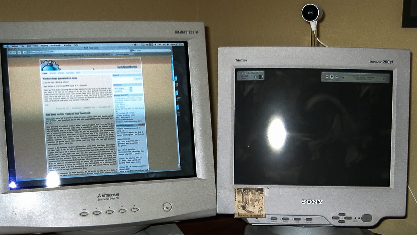 Mitsubishi 19 inch Diamondtron and Sony 17 inch Trinitron monitors back in 2004. Those were the greatest display technologies you could purchase at the time. And yes, cool people, you are correct: that’s a FireWire iSight camera perching on the Trinitron.