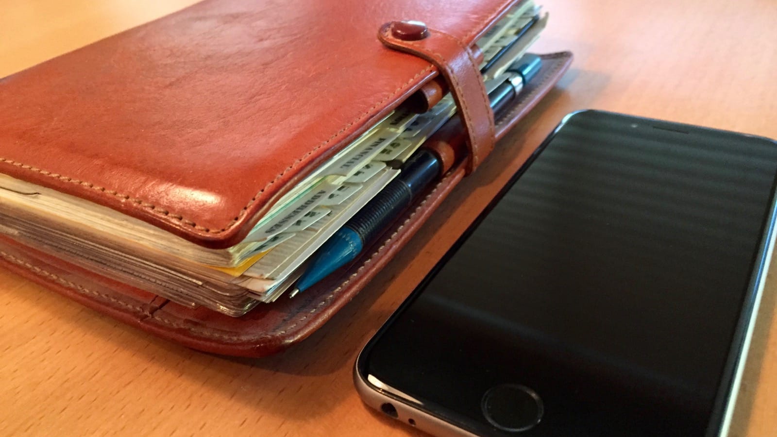 The Filofax I used to run my life for a decade. iPhone 6 for scale.