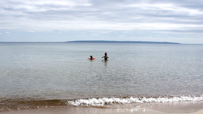 Children swimming in Lake Vättern, Sweden